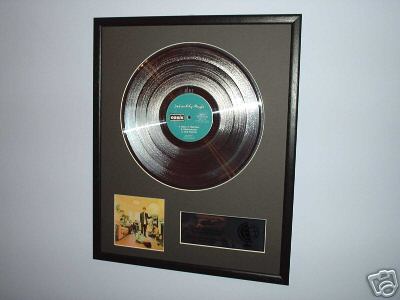 Sold at Auction: Oasis Signed Definitely Maybe Vinyl LP Certified