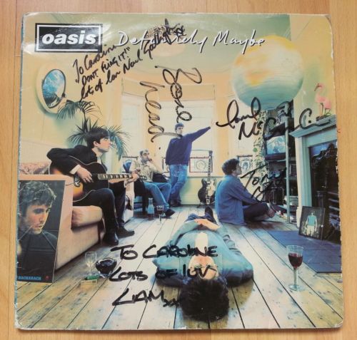 Sold at Auction: Oasis Signed Definitely Maybe Vinyl LP Certified